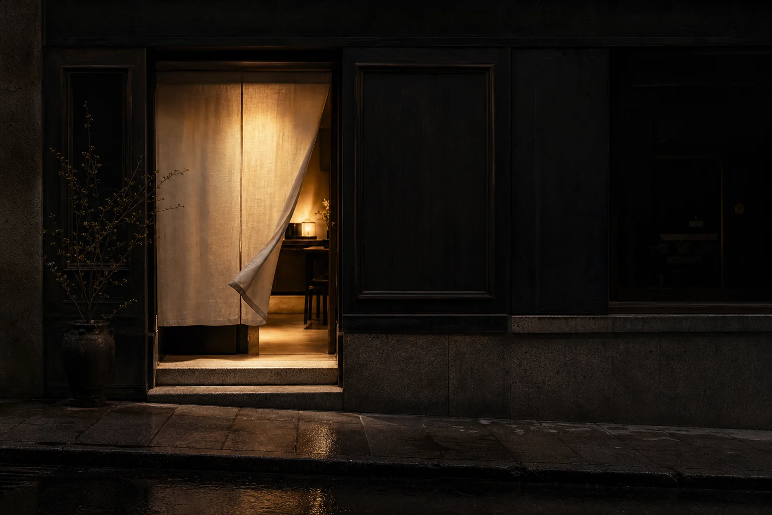 Entrada nocturna del restaurante Wemvy